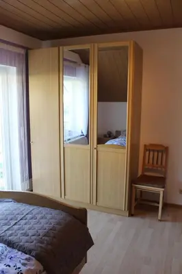 Ein Bett oder Betten in einem Zimmer der Unterkunft Studio Blick ins Tal