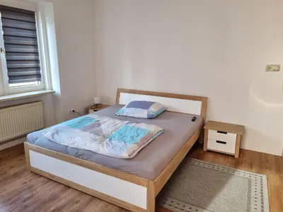 Ein Bett oder Betten in einem Zimmer der Unterkunft MacFeWo - Komplette Ferienwohnung im Stadtkern von Mayen