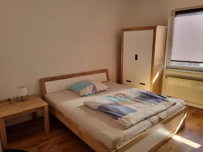 Ein Bett oder Betten in einem Zimmer der Unterkunft MacFeWo - Komplette Ferienwohnung im Stadtkern von Mayen