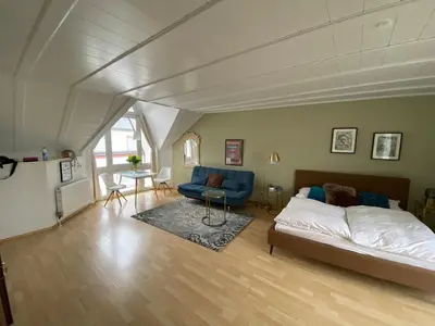 Ein Bett oder Betten in einem Zimmer der Unterkunft Römerburg Apartments Antoniusstrasse