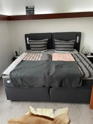 Ein Bett oder Betten in einem Zimmer der Unterkunft Ferienhaus Olaf & Olga Buchali GbR