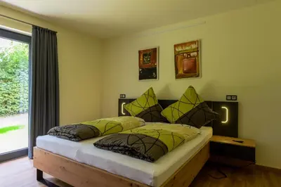 Ein Bett oder Betten in einem Zimmer der Unterkunft Staufenberg Chalets