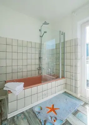 Ein Badezimmer in der Unterkunft Park Hotel