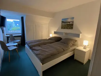 Ein Bett oder Betten in einem Zimmer der Unterkunft Weinzeit Kröv