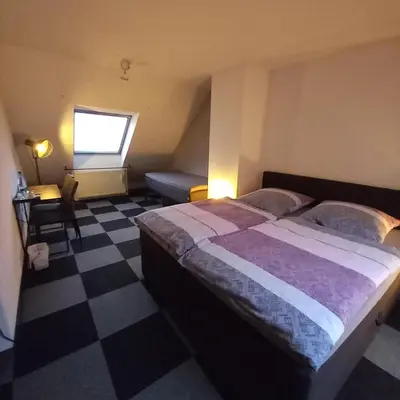 Ein Bett oder Betten in einem Zimmer der Unterkunft Zur alten Metzgerei