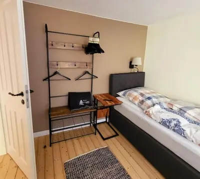 Ein Bett oder Betten in einem Zimmer der Unterkunft _Ferienhaus Leutesdorf Rheinzeit 614 schönes Haus direkt am Rhein