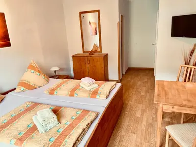 Ein Bett oder Betten in einem Zimmer der Unterkunft Gästezimmer Bruno