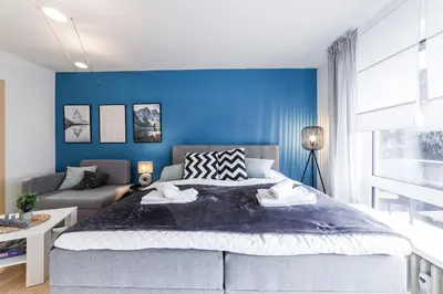Ein Bett oder Betten in einem Zimmer der Unterkunft DEHOME - Laguna - Stay by Central Station