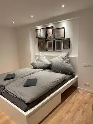 Ein Bett oder Betten in einem Zimmer der Unterkunft Dein Haus am Rhein