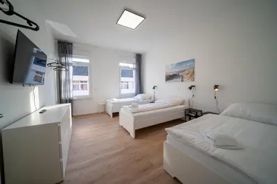Ein Bett oder Betten in einem Zimmer der Unterkunft DQ02 - Geräumige Monteurwohnung Koblenz
