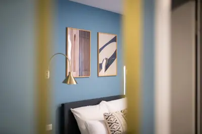 Ein Bett oder Betten in einem Zimmer der Unterkunft Arbio I Central Apartments Koblenz