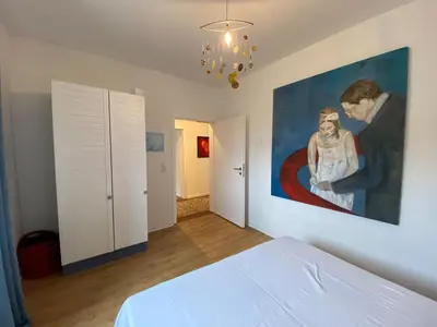 Ein Bett oder Betten in einem Zimmer der Unterkunft NEU! Ferienwohnung Atelier 7