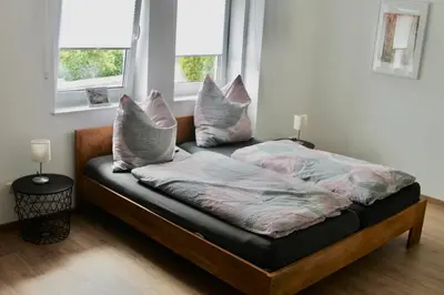 Ein Bett oder Betten in einem Zimmer der Unterkunft Ferienwohnung Faber