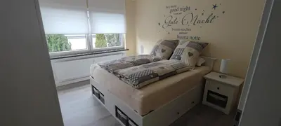 Ein Bett oder Betten in einem Zimmer der Unterkunft Ferienwohnung Räuberhöhle