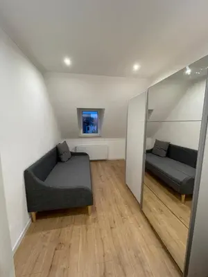 Ein Sitzbereich in der Unterkunft Stadthaus Apartment Bachperle