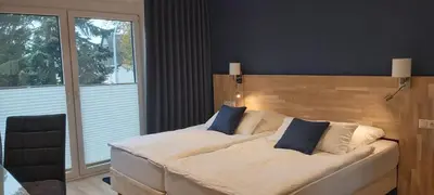 Ein Bett oder Betten in einem Zimmer der Unterkunft Maison Vulkanstein