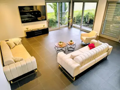 Ein Sitzbereich in der Unterkunft Villa