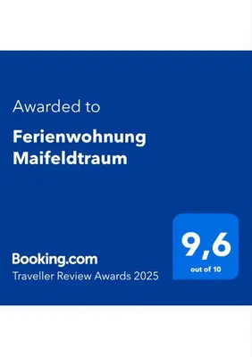Ein Zertifikat, Auszeichnung, Logo oder anderes Dokument, das in der Unterkunft Ferienwohnung Maifeldtraum ausgestellt ist