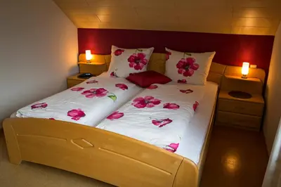 Ein Bett oder Betten in einem Zimmer der Unterkunft Apartments Stiftshof