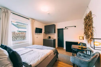 Ein Bett oder Betten in einem Zimmer der Unterkunft Premium Apartments Koblenz