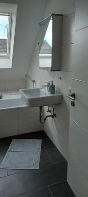 Ein Badezimmer in der Unterkunft Haus Erika