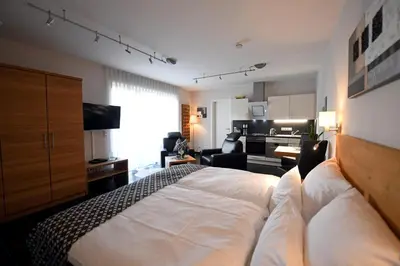 Ein Bett oder Betten in einem Zimmer der Unterkunft Weingut Heinen