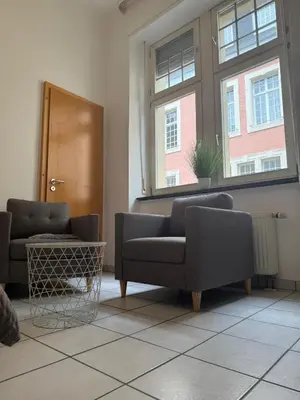 Ein Sitzbereich in der Unterkunft Ferienwohnungen am Gestade Wohnung 3