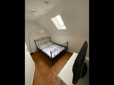 Ein Bett oder Betten in einem Zimmer der Unterkunft NEU! Ferienhaus Helena