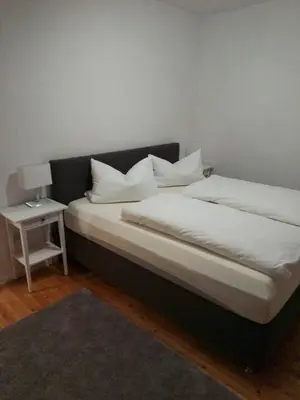Ein Bett oder Betten in einem Zimmer der Unterkunft Große PRIVATE SPA WELLNESS Ferienwohnung in KOBLENZ NÄHE ZUM RHEIN