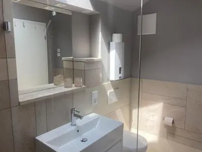Ein Badezimmer in der Unterkunft Querhaus Kanzem