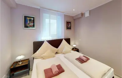 Ein Bett oder Betten in einem Zimmer der Unterkunft 2 Bedroom Gorgeous Apartment In Burgen