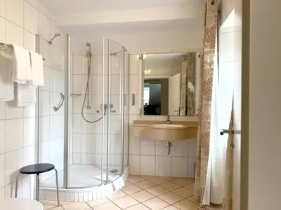 Ein Badezimmer in der Unterkunft Zum Simonbräu
