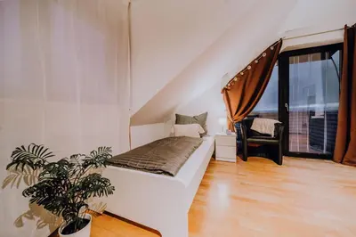 Ein Bett oder Betten in einem Zimmer der Unterkunft Große 3 Zimmer Ferienwohnung Koblenz Wallersheim mit PKW Stellplatz