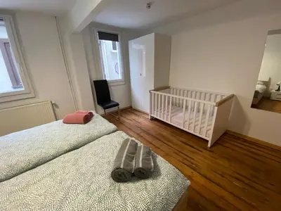 Ein Bett oder Betten in einem Zimmer der Unterkunft Ferienhaus Mama Rhein - 134mq