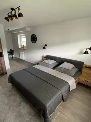Ein Bett oder Betten in einem Zimmer der Unterkunft Ferienwohnung LauterWein
