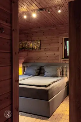 Ein Bett oder Betten in einem Zimmer der Unterkunft Holzblockhaus, Eifel