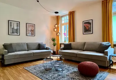 Ein Sitzbereich in der Unterkunft VonMos City Apartments