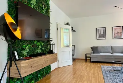 Ein Sitzbereich in der Unterkunft VonMos City Apartments