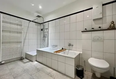 Ein Badezimmer in der Unterkunft VonMos City Apartments
