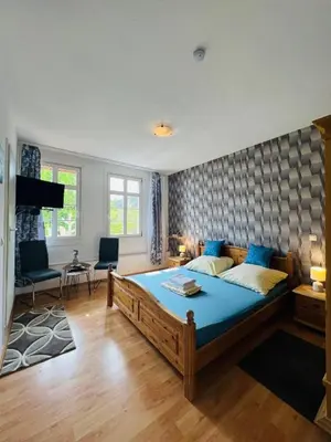 Ein Bett oder Betten in einem Zimmer der Unterkunft Hotel My My