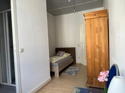 Ein Bett oder Betten in einem Zimmer der Unterkunft Hotel My My