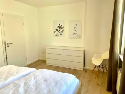 Ein Bett oder Betten in einem Zimmer der Unterkunft NEU!!! Moselbleibe Winzerhaus Kues