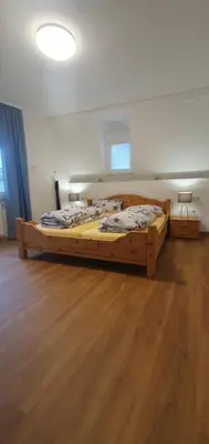 Ein Bett oder Betten in einem Zimmer der Unterkunft Ferienhaus Sonni