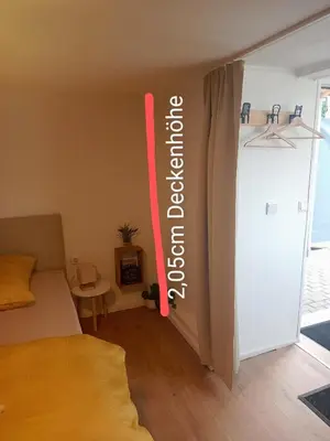 Ein Bett oder Betten in einem Zimmer der Unterkunft Stübchen