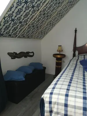 Ein Bett oder Betten in einem Zimmer der Unterkunft Gästehaus Fuchsröhre