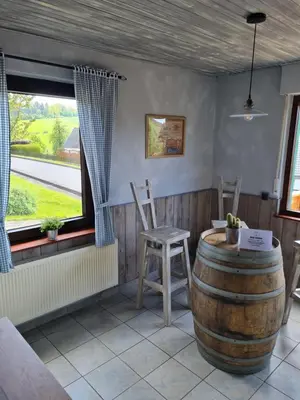 Ein Sitzbereich in der Unterkunft Western Cottage Hocheifel