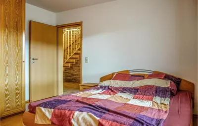 Ein Bett oder Betten in einem Zimmer der Unterkunft Nice Home In Bad Ems With Kitchen