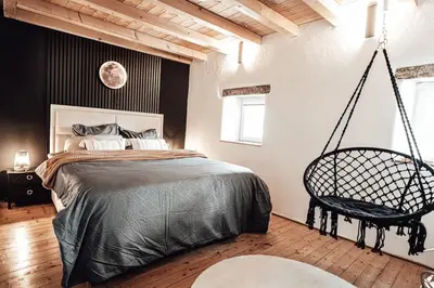 Ein Bett oder Betten in einem Zimmer der Unterkunft Cloud 9