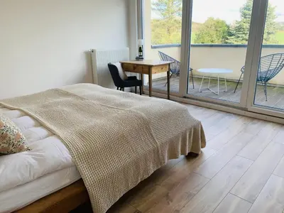 Ein Bett oder Betten in einem Zimmer der Unterkunft Ferienhaus Sonnenaufgang