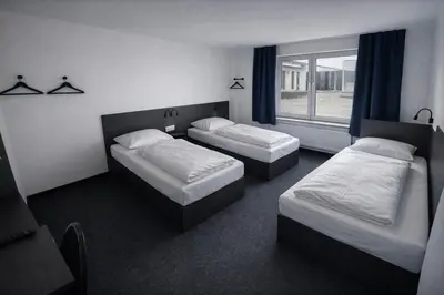 Ein Bett oder Betten in einem Zimmer der Unterkunft Zzzimple - Self Check-In